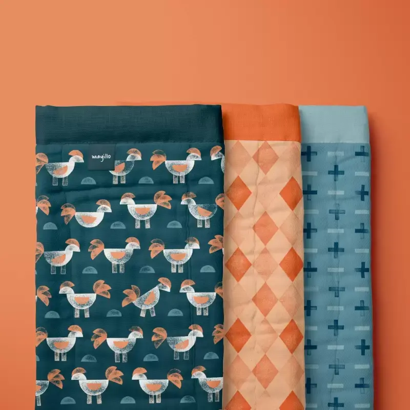 Burp cloth with chicken, harlequin and plus minus pattern