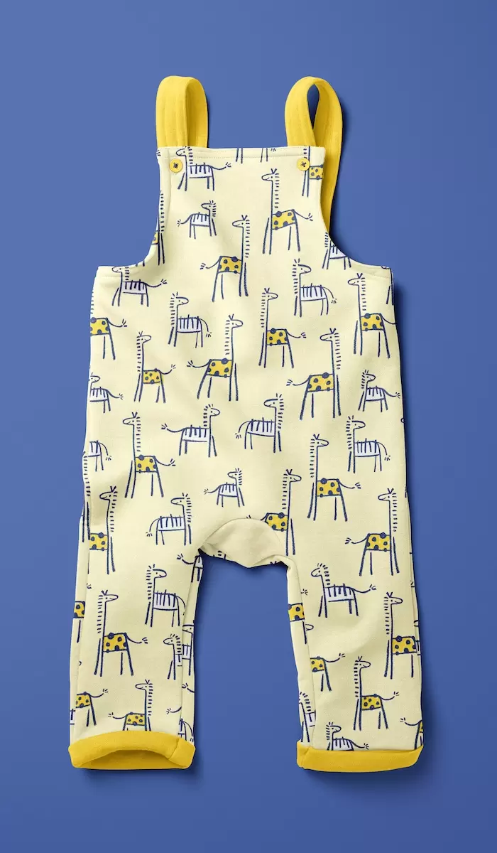 Crayon giraffe and zebra patterned dungaree