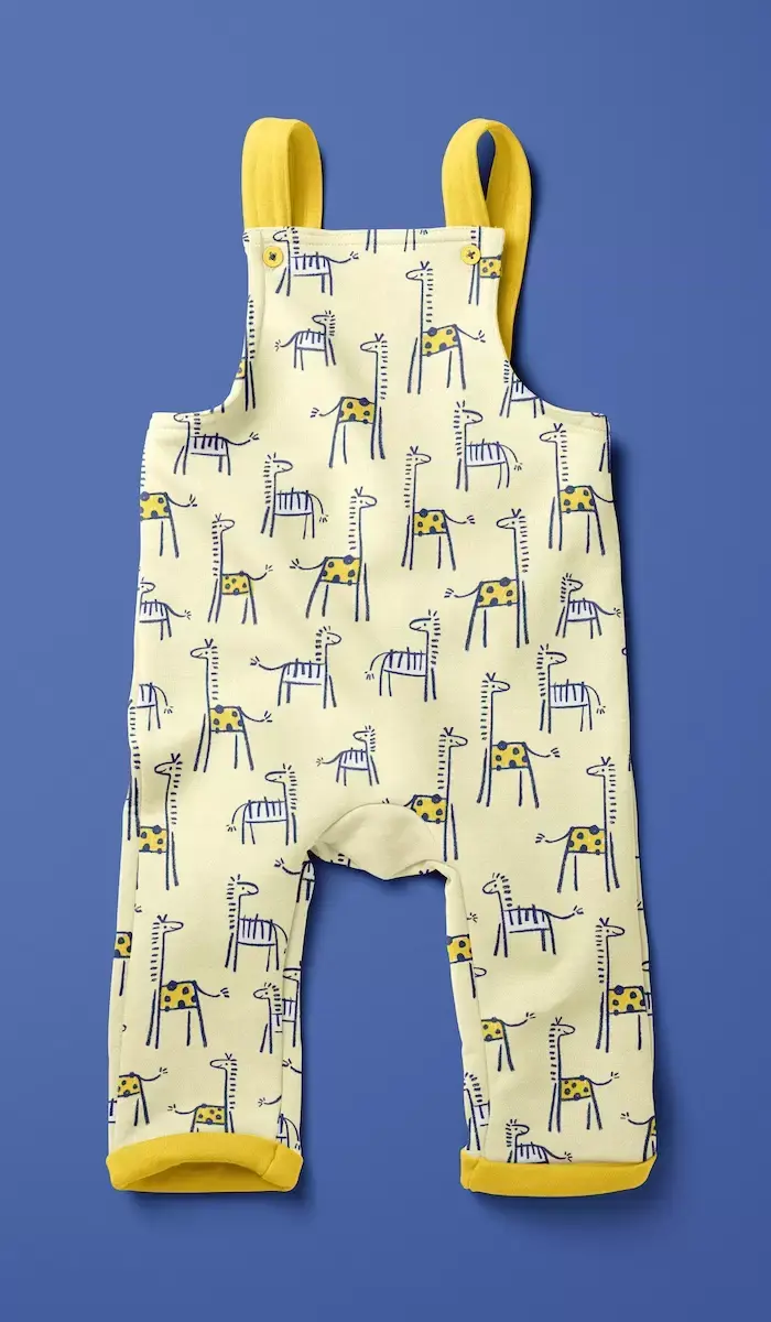 Crayon giraffe and zebra patterned dungaree
